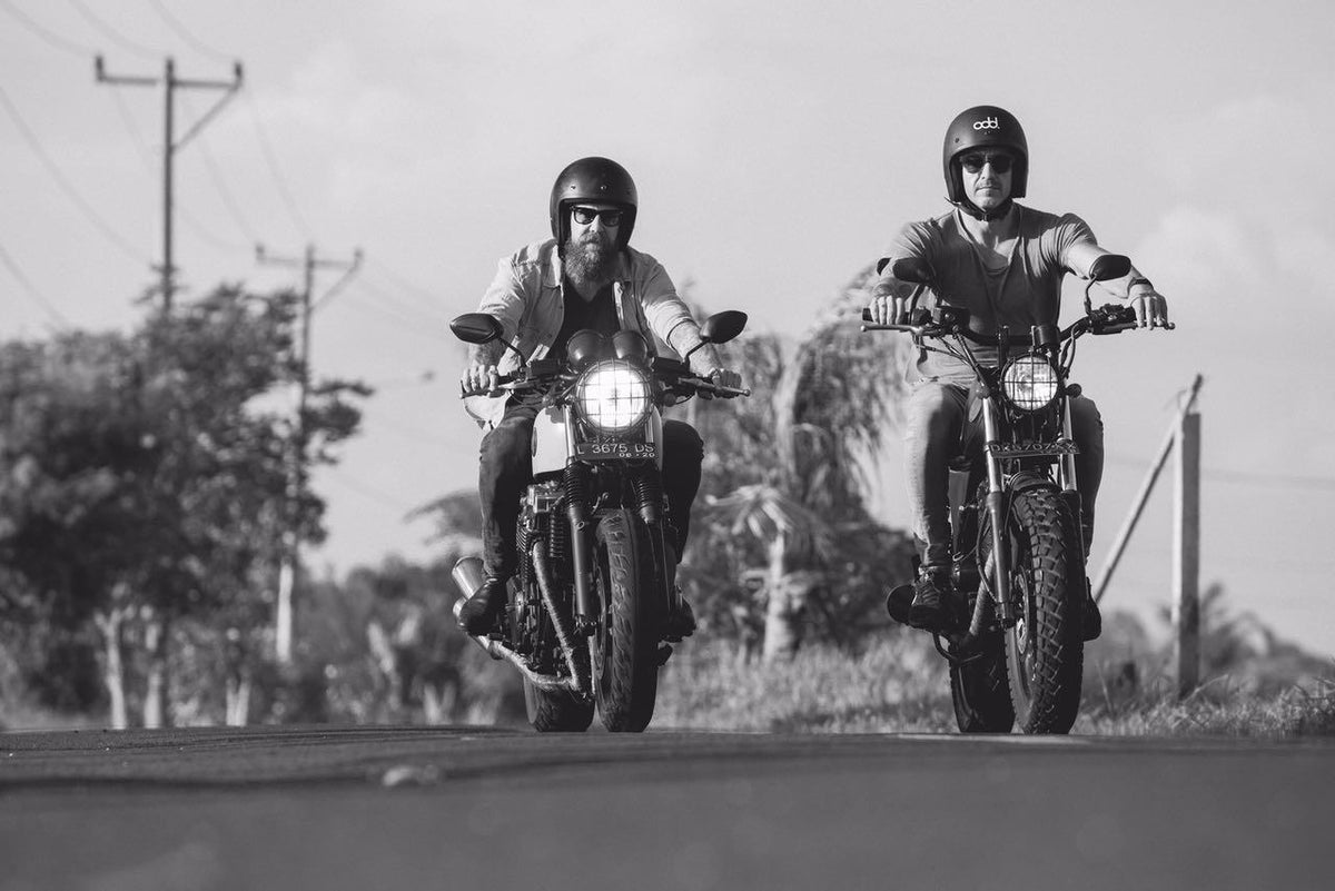 Two Malamadre riders on custom motorcycles